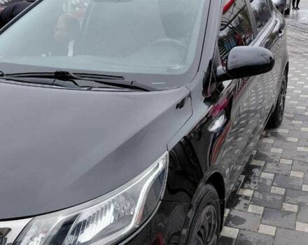 Черный Киа Рио, объемом двигателя 1.4 л и пробегом 100 тыс. км за 7607 $, фото 2 на Automoto.ua
