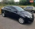 Чорний Кіа Ріо, об'ємом двигуна 1.4 л та пробігом 203 тис. км за 4900 $, фото 1 на Automoto.ua