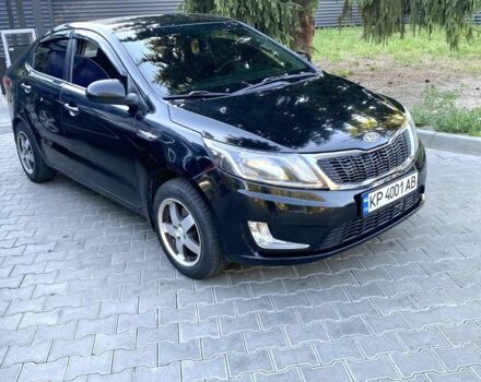 Черный Киа Рио, объемом двигателя 1.6 л и пробегом 330 тыс. км за 6300 $, фото 2 на Automoto.ua