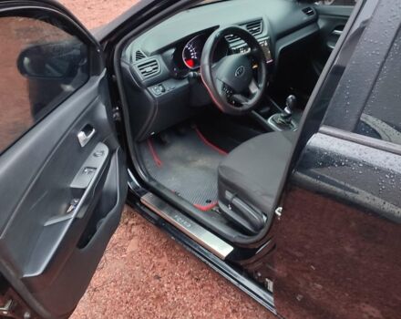 Чорний Кіа Ріо, об'ємом двигуна 1.4 л та пробігом 170 тис. км за 8500 $, фото 10 на Automoto.ua