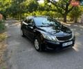 Чорний Кіа Ріо, об'ємом двигуна 1.4 л та пробігом 165 тис. км за 7900 $, фото 5 на Automoto.ua