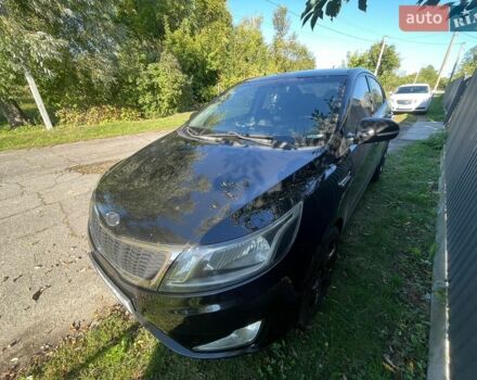 Чорний Кіа Ріо, об'ємом двигуна 1.59 л та пробігом 274 тис. км за 7500 $, фото 1 на Automoto.ua