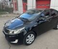 Чорний Кіа Ріо, об'ємом двигуна 1.6 л та пробігом 273 тис. км за 6200 $, фото 1 на Automoto.ua