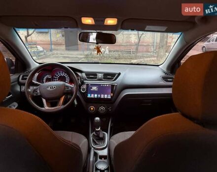 Чорний Кіа Ріо, об'ємом двигуна 1.4 л та пробігом 154 тис. км за 7500 $, фото 1 на Automoto.ua