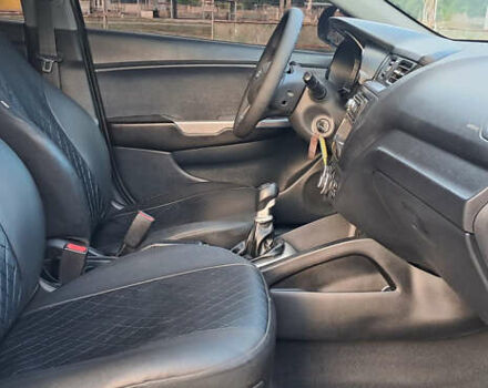 Чорний Кіа Ріо, об'ємом двигуна 1.4 л та пробігом 89 тис. км за 6800 $, фото 6 на Automoto.ua
