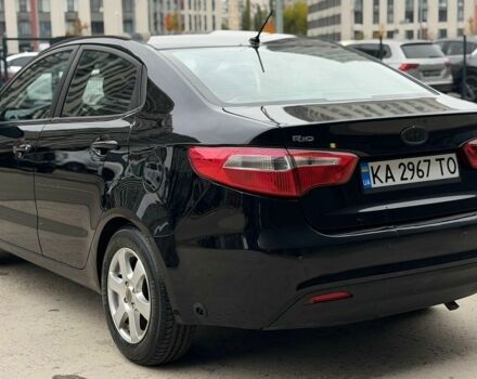 Чорний Кіа Ріо, об'ємом двигуна 1.4 л та пробігом 202 тис. км за 6900 $, фото 2 на Automoto.ua