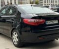 Чорний Кіа Ріо, об'ємом двигуна 1.4 л та пробігом 202 тис. км за 6900 $, фото 2 на Automoto.ua