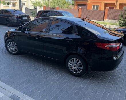 Чорний Кіа Ріо, об'ємом двигуна 1.4 л та пробігом 103 тис. км за 7999 $, фото 5 на Automoto.ua