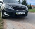 Чорний Кіа Ріо, об'ємом двигуна 1.4 л та пробігом 190 тис. км за 5500 $, фото 1 на Automoto.ua