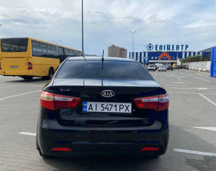 Чорний Кіа Ріо, об'ємом двигуна 1.4 л та пробігом 100 тис. км за 5999 $, фото 2 на Automoto.ua