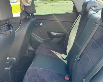 Чорний Кіа Ріо, об'ємом двигуна 1.4 л та пробігом 158 тис. км за 8300 $, фото 14 на Automoto.ua