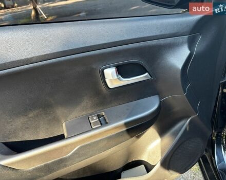 Чорний Кіа Ріо, об'ємом двигуна 1.4 л та пробігом 165 тис. км за 6900 $, фото 19 на Automoto.ua