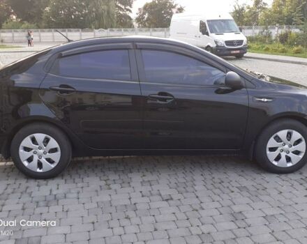Чорний Кіа Ріо, об'ємом двигуна 1.4 л та пробігом 80 тис. км за 8700 $, фото 2 на Automoto.ua