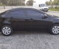 Чорний Кіа Ріо, об'ємом двигуна 1.4 л та пробігом 80 тис. км за 8700 $, фото 2 на Automoto.ua
