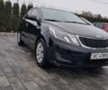 Черный Киа Рио, объемом двигателя 1.4 л и пробегом 244 тыс. км за 6900 $, фото 1 на Automoto.ua