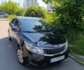 Чорний Кіа Ріо, об'ємом двигуна 1.4 л та пробігом 162 тис. км за 7500 $, фото 1 на Automoto.ua
