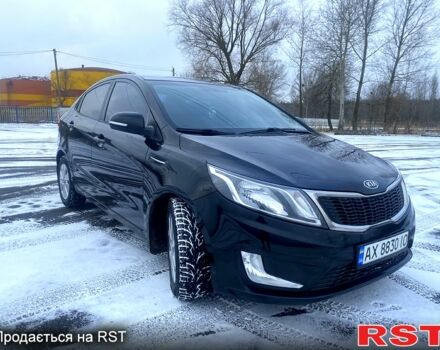 Черный Киа Рио, объемом двигателя 1.6 л и пробегом 25000 тыс. км за 6900 $, фото 2 на Automoto.ua
