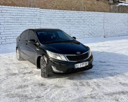 Чорний Кіа Ріо, об'ємом двигуна 1.6 л та пробігом 270 тис. км за 6499 $, фото 2 на Automoto.ua