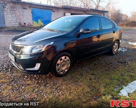 Чорний Кіа Ріо, об'ємом двигуна 1.6 л та пробігом 17900 тис. км за 8400 $, фото 2 на Automoto.ua