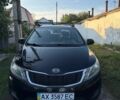 Чорний Кіа Ріо, об'ємом двигуна 1.4 л та пробігом 73 тис. км за 8900 $, фото 1 на Automoto.ua