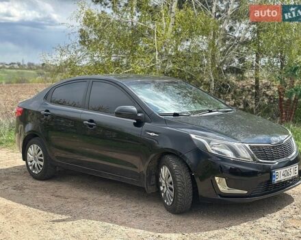 Черный Киа Рио, объемом двигателя 1.4 л и пробегом 108 тыс. км за 7950 $, фото 2 на Automoto.ua