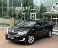 Чорний Кіа Ріо, об'ємом двигуна 1.6 л та пробігом 166 тис. км за 7821 $, фото 1 на Automoto.ua