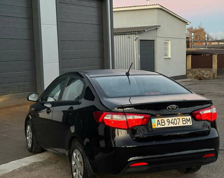 Чорний Кіа Ріо, об'ємом двигуна 1.4 л та пробігом 136 тис. км за 6900 $, фото 6 на Automoto.ua