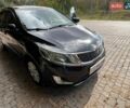 Черный Киа Рио, объемом двигателя 1.59 л и пробегом 160 тыс. км за 8200 $, фото 1 на Automoto.ua