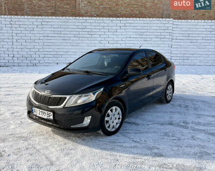Черный Киа Рио, объемом двигателя 1.6 л и пробегом 270 тыс. км за 6650 $, фото 1 на Automoto.ua