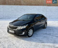 Черный Киа Рио, объемом двигателя 1.6 л и пробегом 270 тыс. км за 6650 $, фото 1 на Automoto.ua