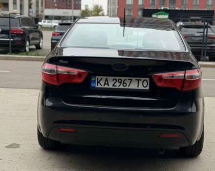 Чорний Кіа Ріо, об'ємом двигуна 1.4 л та пробігом 202 тис. км за 6900 $, фото 3 на Automoto.ua