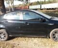 Чорний Кіа Ріо, об'ємом двигуна 1.4 л та пробігом 77 тис. км за 9200 $, фото 3 на Automoto.ua