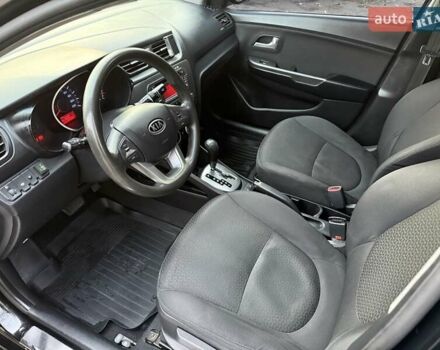 Чорний Кіа Ріо, об'ємом двигуна 1.59 л та пробігом 154 тис. км за 7600 $, фото 11 на Automoto.ua