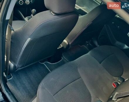 Черный Киа Рио, объемом двигателя 1.4 л и пробегом 95 тыс. км за 7299 $, фото 10 на Automoto.ua