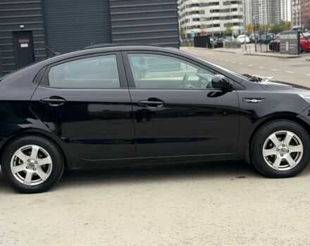 Чорний Кіа Ріо, об'ємом двигуна 1.4 л та пробігом 202 тис. км за 6900 $, фото 5 на Automoto.ua