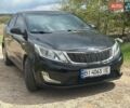 Черный Киа Рио, объемом двигателя 1.4 л и пробегом 108 тыс. км за 7950 $, фото 1 на Automoto.ua