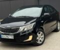Чорний Кіа Ріо, об'ємом двигуна 1.4 л та пробігом 202 тис. км за 6900 $, фото 1 на Automoto.ua