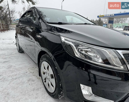 Черный Киа Рио, объемом двигателя 1.4 л и пробегом 155 тыс. км за 7500 $, фото 18 на Automoto.ua