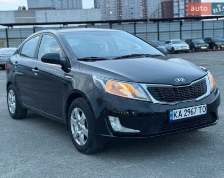 Чорний Кіа Ріо, об'ємом двигуна 1.4 л та пробігом 201 тис. км за 6950 $, фото 6 на Automoto.ua
