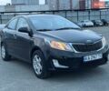 Чорний Кіа Ріо, об'ємом двигуна 1.4 л та пробігом 201 тис. км за 6950 $, фото 6 на Automoto.ua