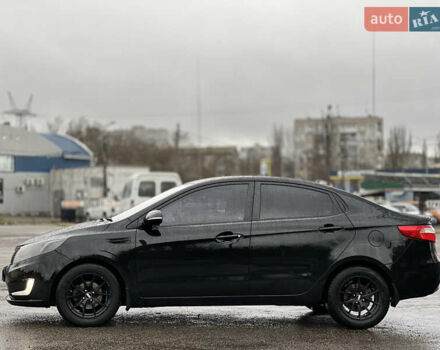 Черный Киа Рио, объемом двигателя 1.6 л и пробегом 231 тыс. км за 7999 $, фото 4 на Automoto.ua