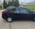 Чорний Кіа Ріо, об'ємом двигуна 1.6 л та пробігом 273 тис. км за 6200 $, фото 3 на Automoto.ua