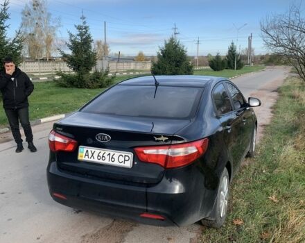 Чорний Кіа Ріо, об'ємом двигуна 1.4 л та пробігом 190 тис. км за 5500 $, фото 3 на Automoto.ua
