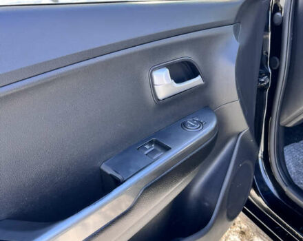 Чорний Кіа Ріо, об'ємом двигуна 1.4 л та пробігом 245 тис. км за 7600 $, фото 27 на Automoto.ua