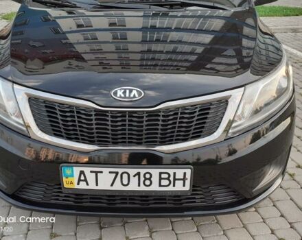 Чорний Кіа Ріо, об'ємом двигуна 1.4 л та пробігом 80 тис. км за 8700 $, фото 11 на Automoto.ua