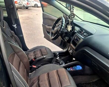 Черный Киа Рио, объемом двигателя 1.4 л и пробегом 197 тыс. км за 7000 $, фото 6 на Automoto.ua