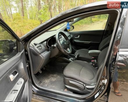Чорний Кіа Ріо, об'ємом двигуна 1.4 л та пробігом 193 тис. км за 6300 $, фото 4 на Automoto.ua