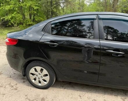 Чорний Кіа Ріо, об'ємом двигуна 1.6 л та пробігом 215 тис. км за 7700 $, фото 14 на Automoto.ua