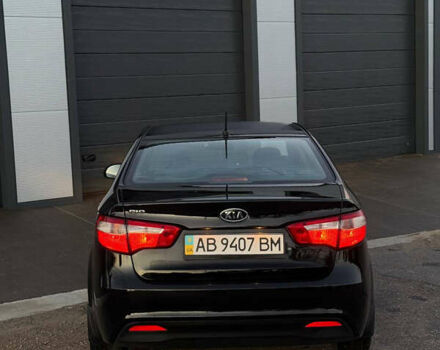 Чорний Кіа Ріо, об'ємом двигуна 1.4 л та пробігом 136 тис. км за 6900 $, фото 7 на Automoto.ua