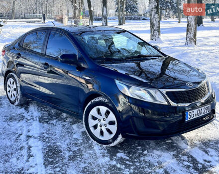 Чорний Кіа Ріо, об'ємом двигуна 1.4 л та пробігом 245 тис. км за 7600 $, фото 7 на Automoto.ua